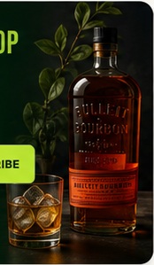 Bourbon bottle with a glass of whiskey